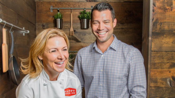 A smiling man and woman from Happy Food Co.